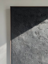 Load image into Gallery viewer, detail shot of off-black, 'wabi-sabi' style textured artwork framed in walnut colour tray frame