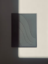 Load image into Gallery viewer, off black minimalist textured artwork with line detail and wave design framed in black metal frame