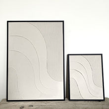 Load image into Gallery viewer, beige minimalist textured artwork with line detail and wave design framed in black metal frame in various sizes