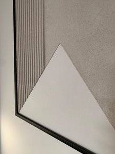 textured wall art triangle design neutral close up